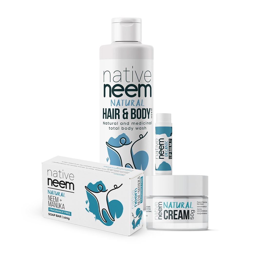 A set of Native Neem natural body care products on a white background, including a Hair & Body wash bottle, a Cream jar, a tube, and a Soap Bar box.